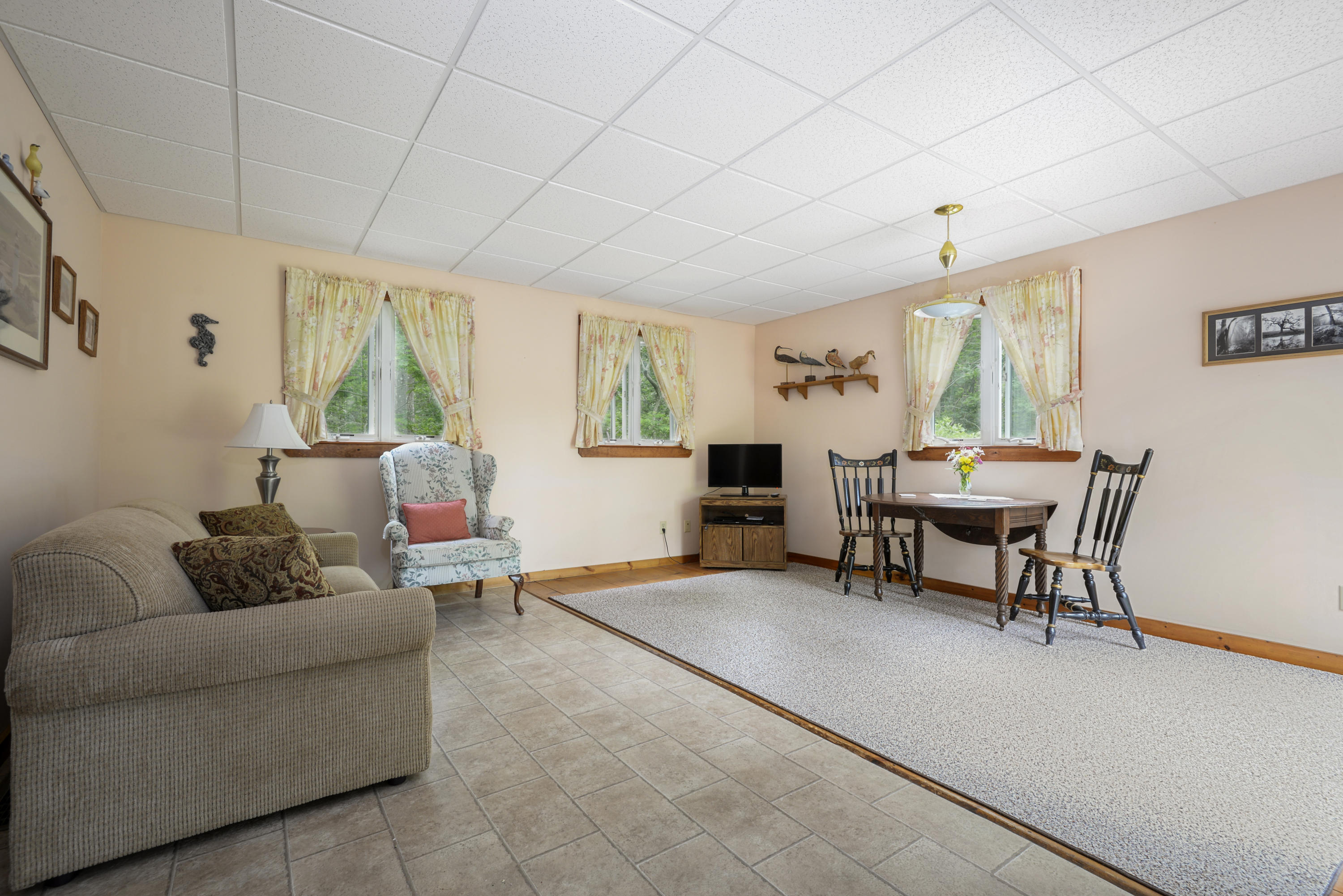 5490 State Highway Eastham, MA 02642 - Photo 18 of 28 a living room with furniture and a large window