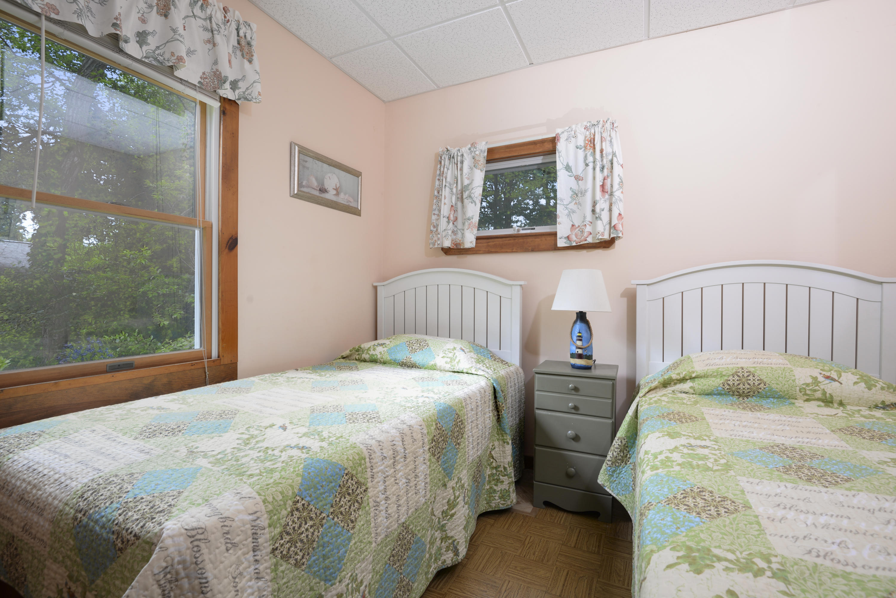 5490 State Highway Eastham, MA 02642 - Photo 21 of 28 a bedroom with two beds and a window