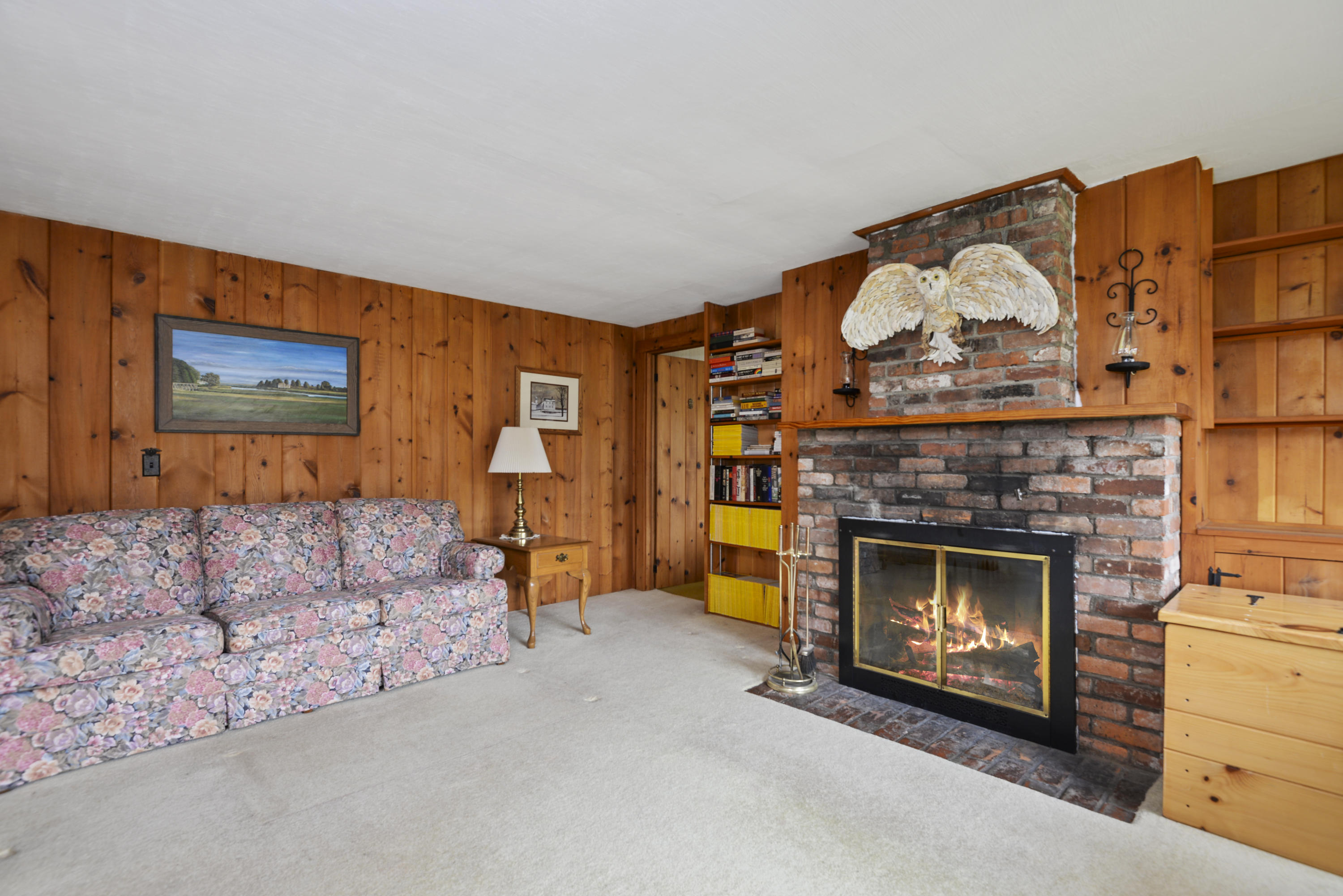5490 State Highway Eastham, MA 02642 - Photo 6 of 28 a living room with furniture and a fireplace