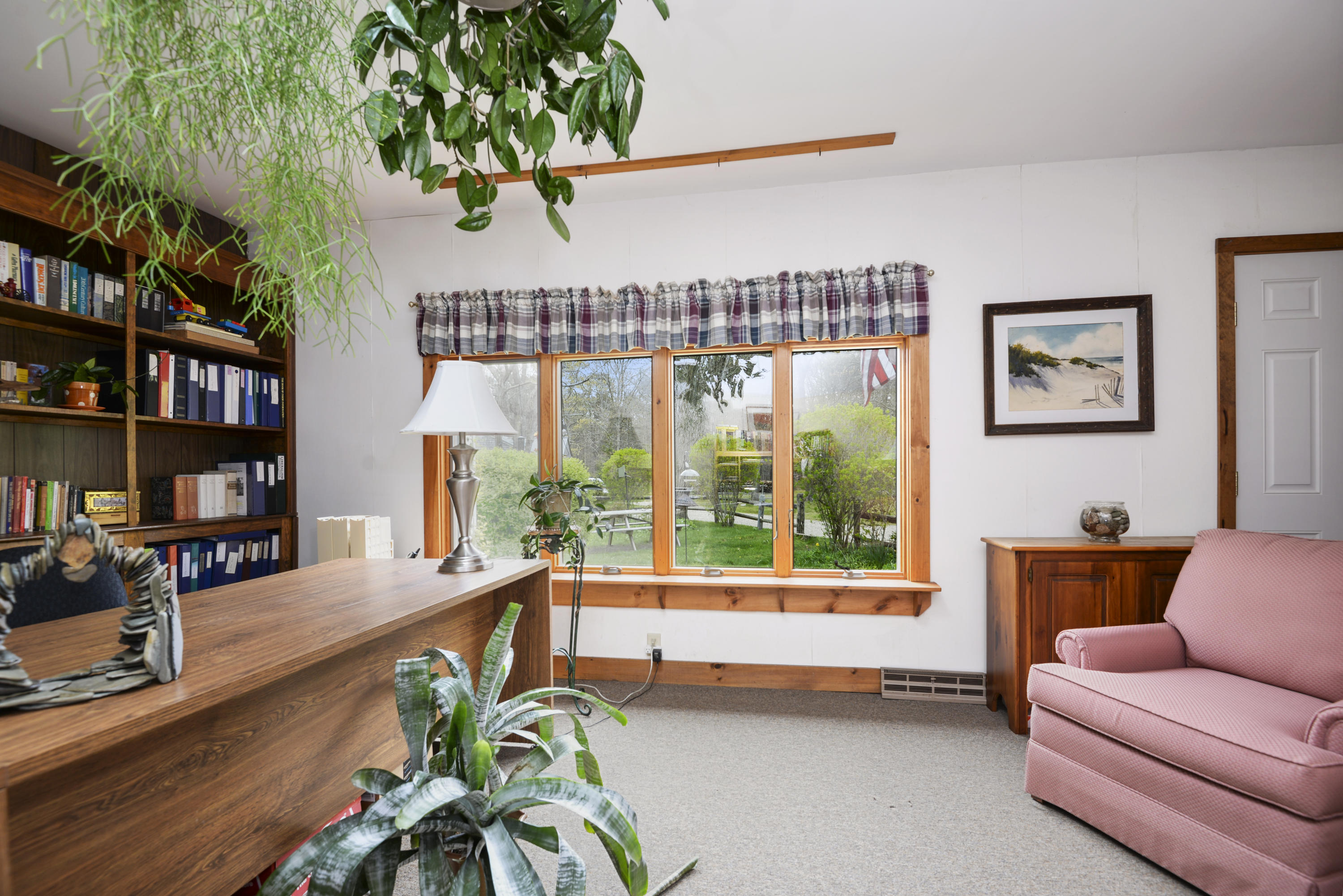 5490 State Highway Eastham, MA 02642 - Photo 10 of 28 a living room with furniture plant and a window