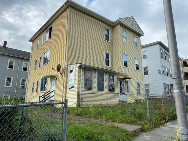 220 Vernon Street Worcester, MA 01607 - Photo 1 of 29 a view of a white house next to a yard