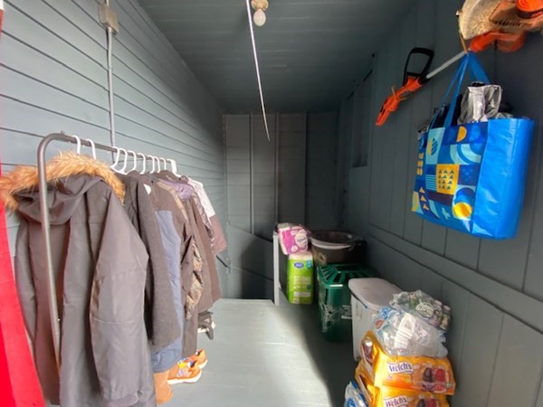 220 Vernon Street Worcester, MA 01607 - Photo 14 of 29 a view of walk in closet with clothes and shoes