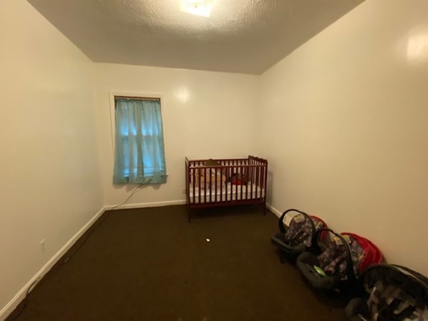 220 Vernon Street Worcester, MA 01607 - Photo 23 of 29 a view of a livingroom with lounge chair and a window