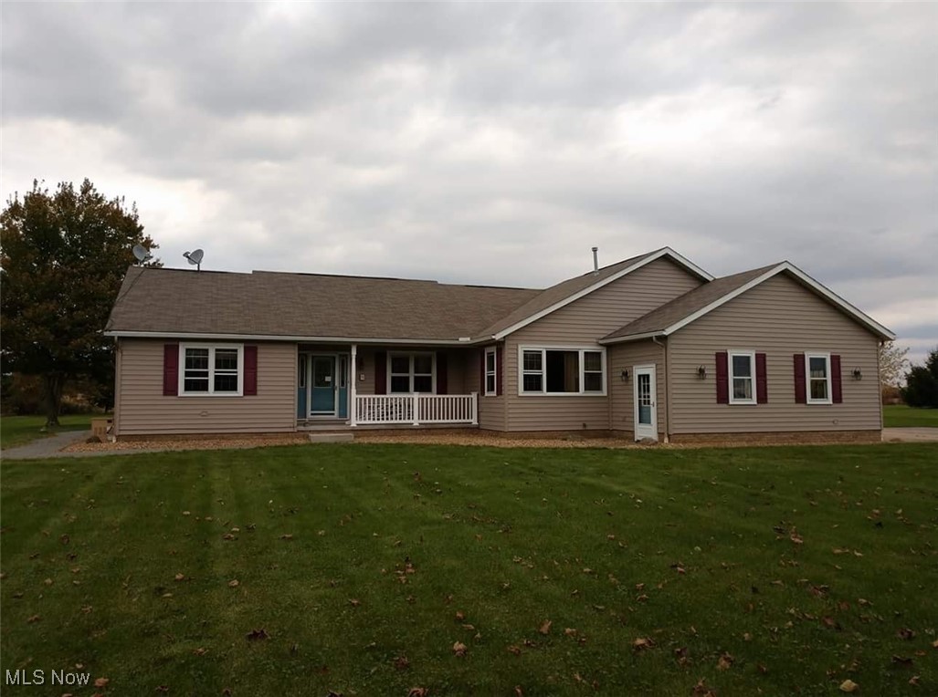 2291 Armstrong Road Wooster, OH 44691 - Photo 1 of 23 Ranch-style home featuring a front yard and covered porch