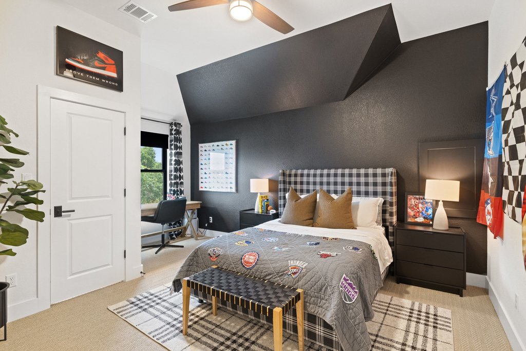 2324 High Lonesome Leander, TX 78641 - Photo 29 of 40 Bedroom 3 features an accent wall and a nook ideal for a desk.