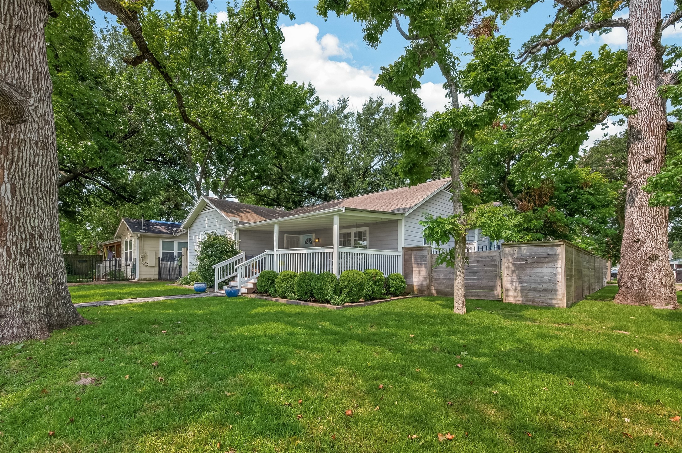 2019 Gostick Street Houston, TX 77008 - Photo 7 of 36 a front view of a house with a yard and trees