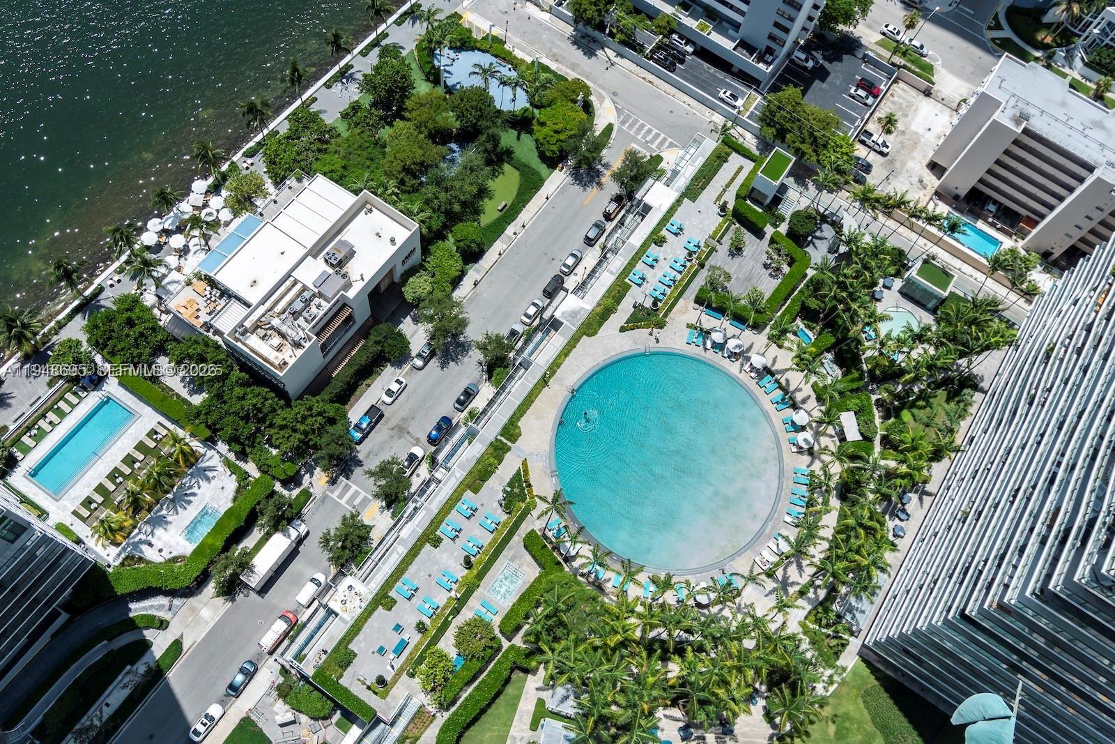 650 Northeast 32nd Street, Unit 4306 Miami, FL 33137 - Photo 33 of 52 an aerial view of a house a yard and a garden