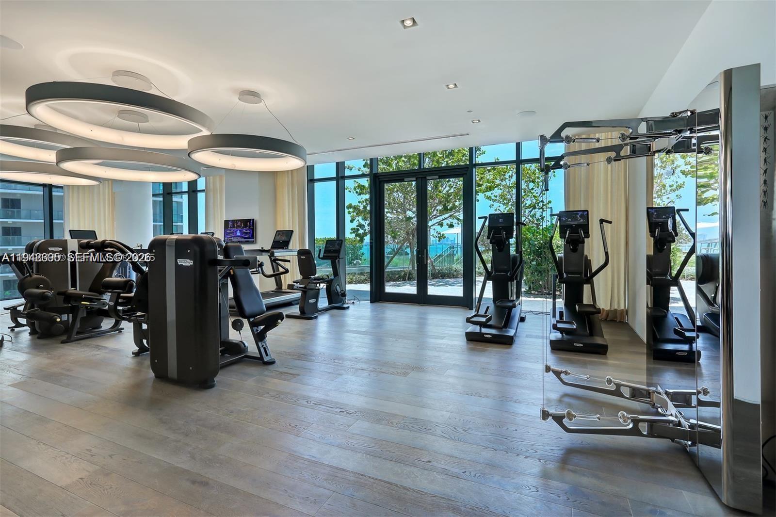 650 Northeast 32nd Street, Unit 4306 Miami, FL 33137 - Photo 39 of 52 a view of a room with gym equipment