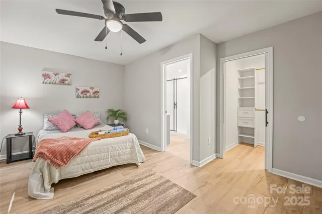 a bathroom with a toilet sink and shower