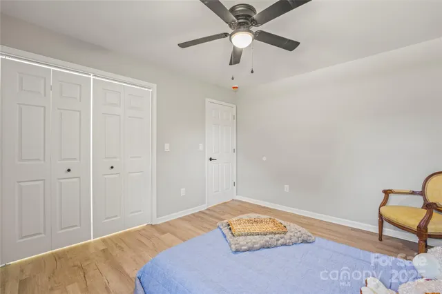 a workspace with furniture and chandelier
