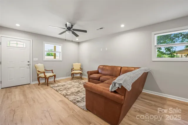 a view of backyard with a deck