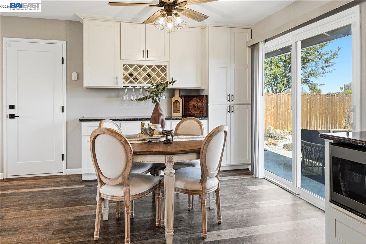 1279 Marigold Road Livermore, CA 94551 - Photo 13 of 53 a view of a dining room with furniture window and wooden floor