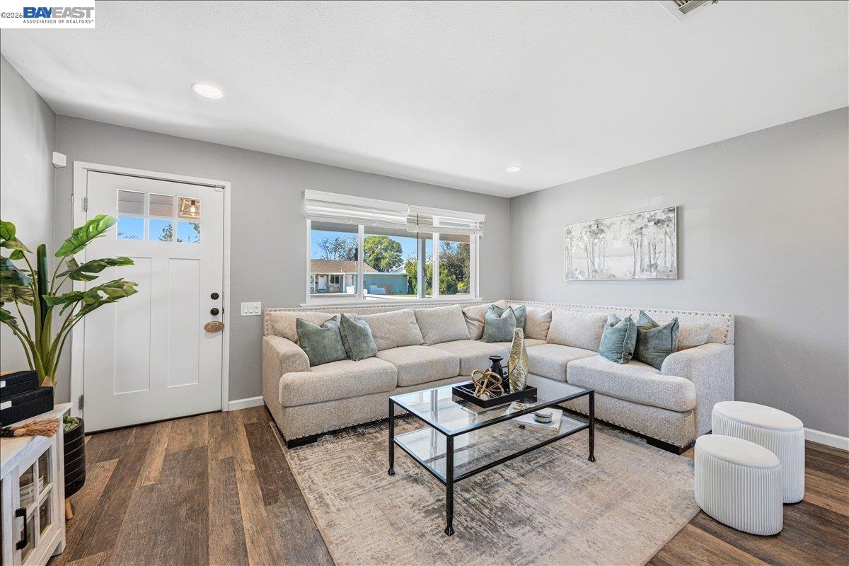 1279 Marigold Road Livermore, CA 94551 - Photo 16 of 53 a living room with furniture and a potted plant