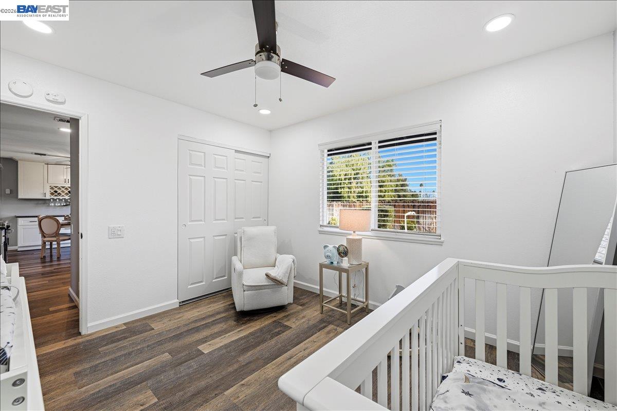 1279 Marigold Road Livermore, CA 94551 - Photo 25 of 53 a view of a room with wooden floor and windows