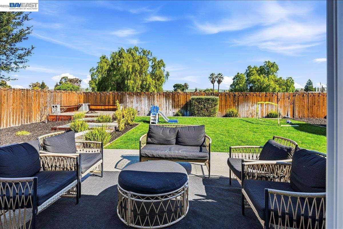 1279 Marigold Road Livermore, CA 94551 - Photo 31 of 53 a view of an outdoor sitting area with furniture and a garden
