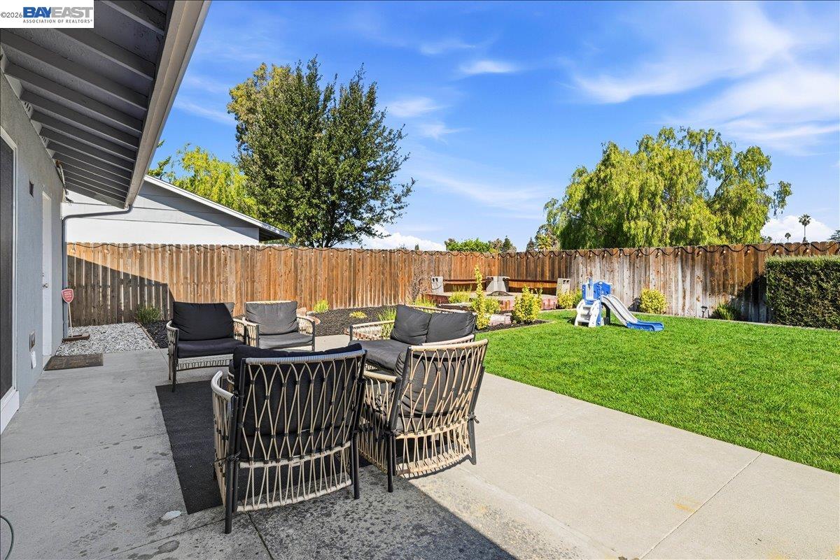 1279 Marigold Road Livermore, CA 94551 - Photo 32 of 53 a view of a patio with a table and chairs