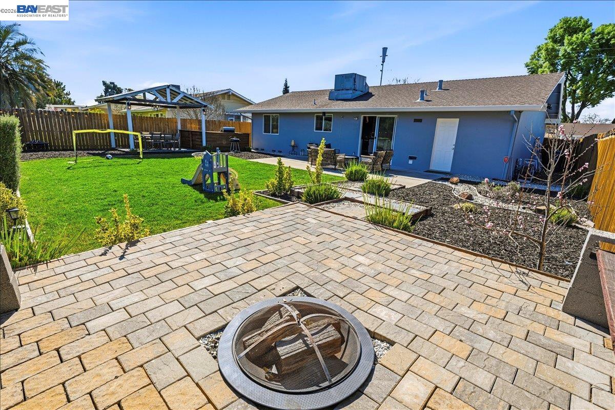 1279 Marigold Road Livermore, CA 94551 - Photo 37 of 53 a view of a house with backyard porch and sitting area