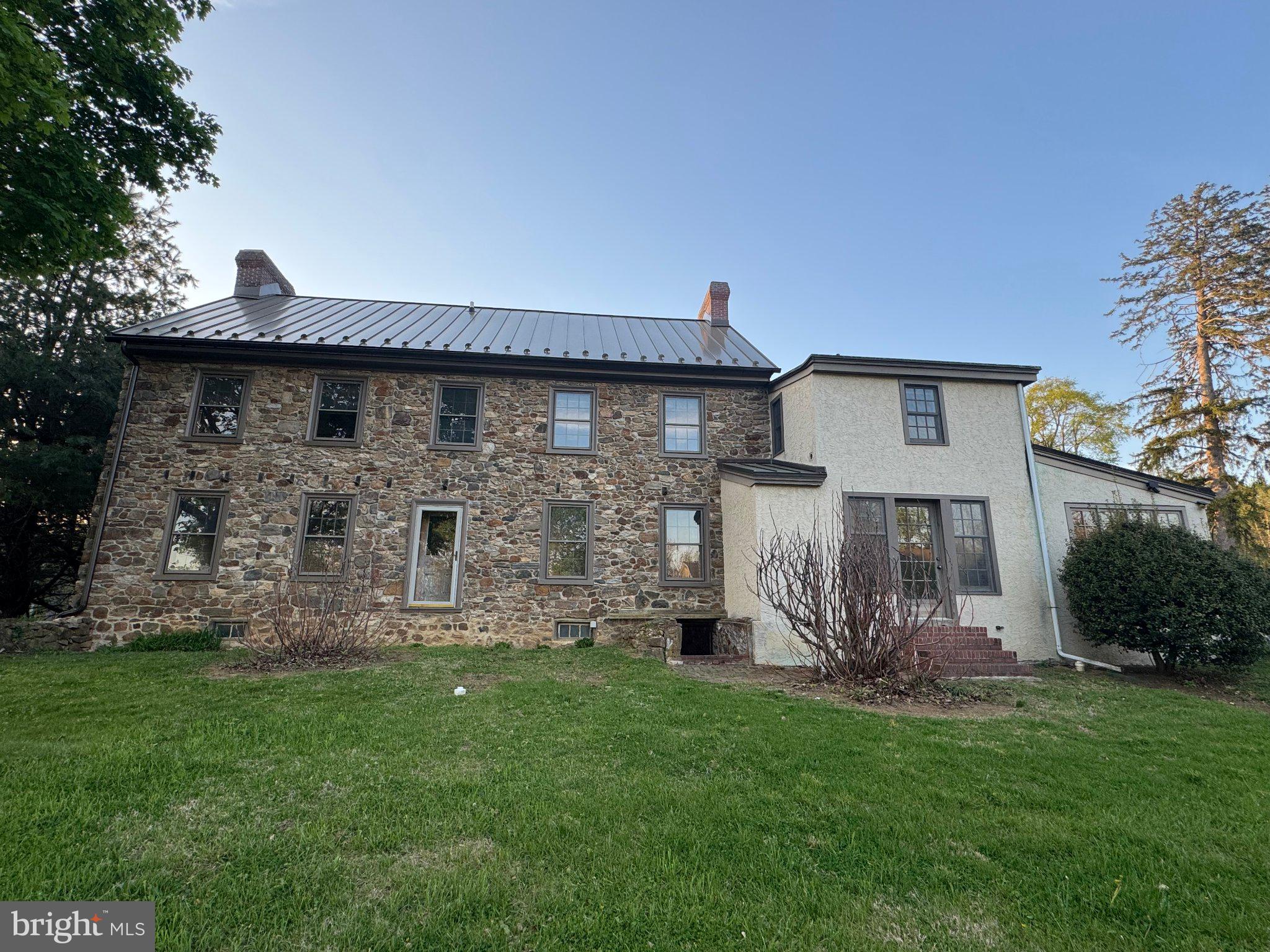 702 Lenape Road West Chester, PA 19382 - Photo 3 of 12 Charming blend of stone and modern style.