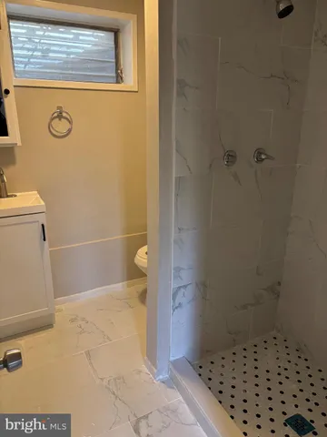 a bathroom with a sink and a toilet