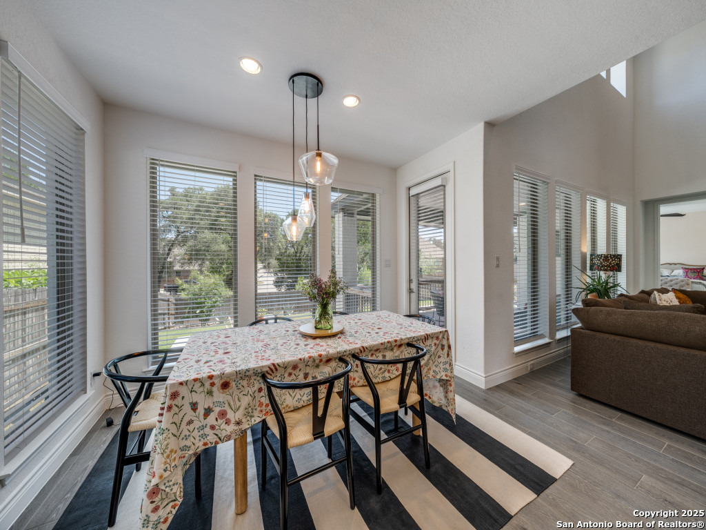 25902 Madison Ranch San Antonio, TX 78255 - Photo 17 of 36 a view of a dining room with furniture window and outside view