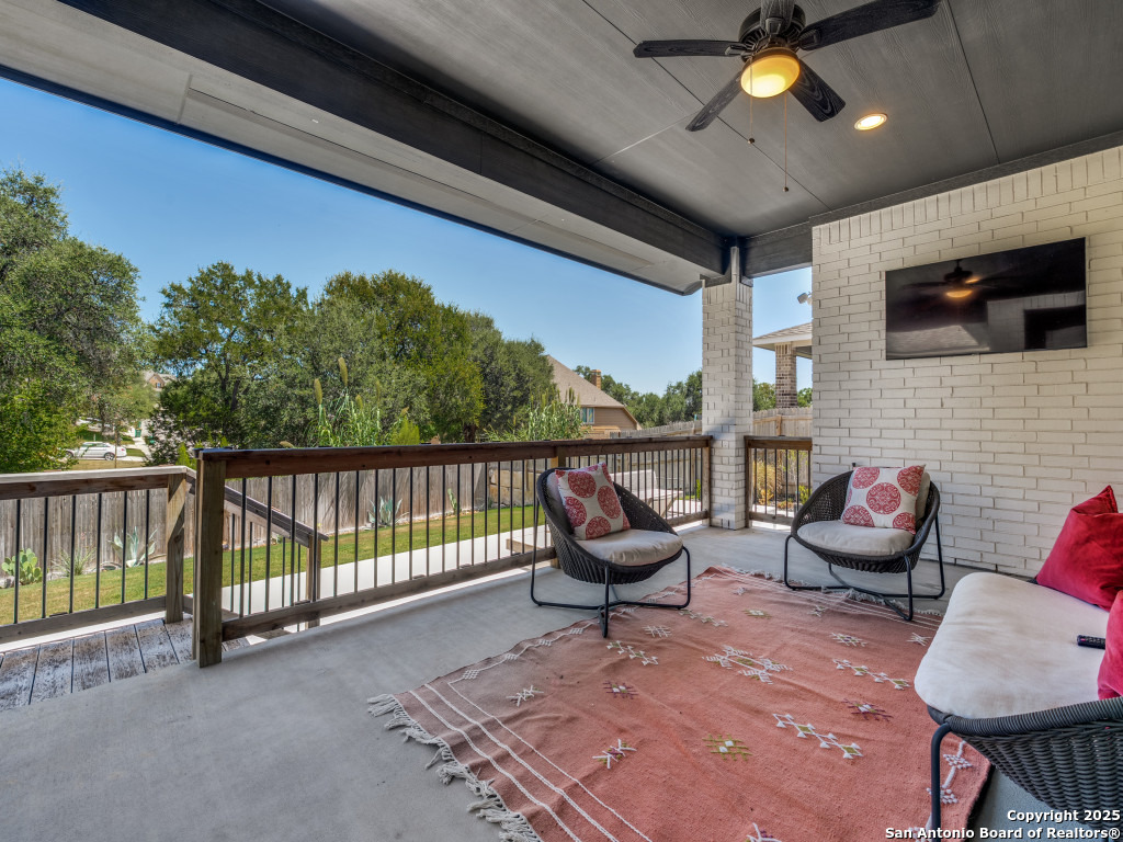 25902 Madison Ranch San Antonio, TX 78255 - Photo 33 of 36 a roof deck with couches and potted plants