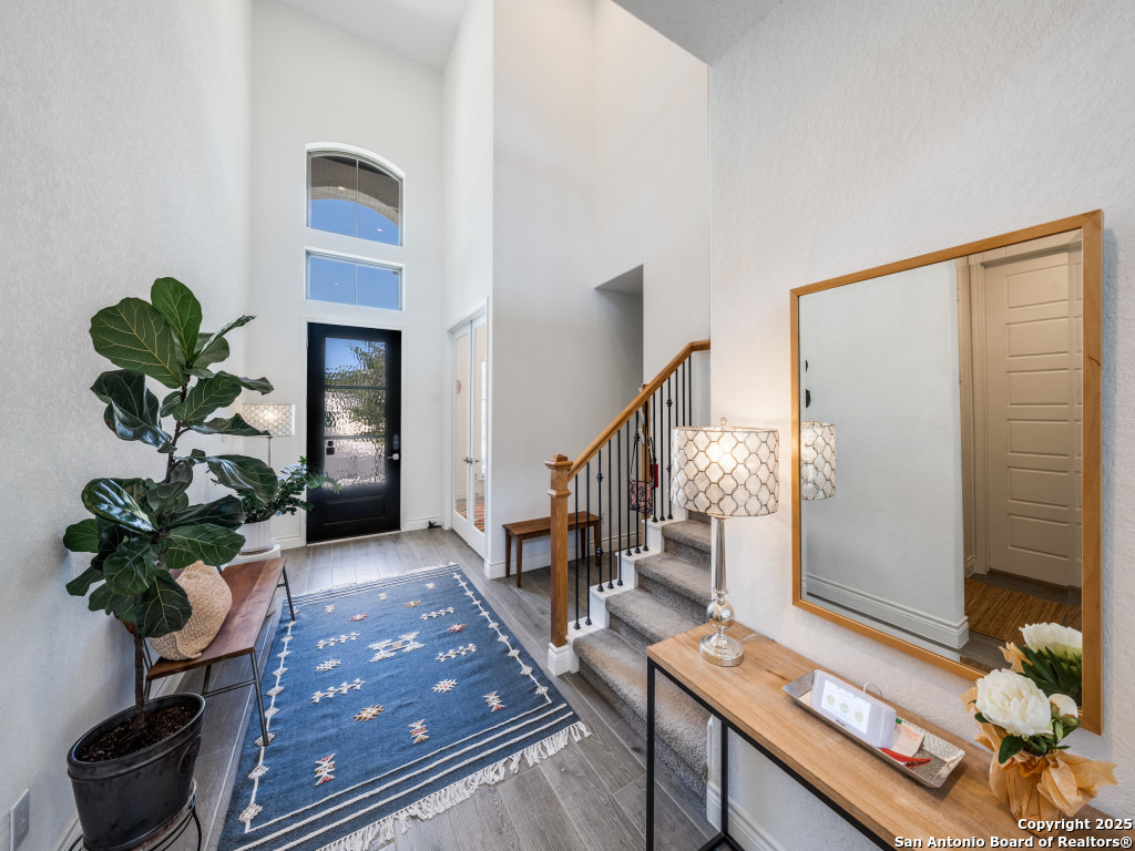 25902 Madison Ranch San Antonio, TX 78255 - Photo 4 of 36 a living room with furniture flowerpot and a potted plant