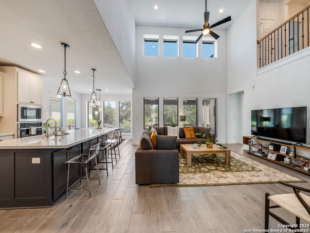 25902 Madison Ranch San Antonio, TX 78255 - Photo 9 of 36 a living room with furniture and a flat screen tv