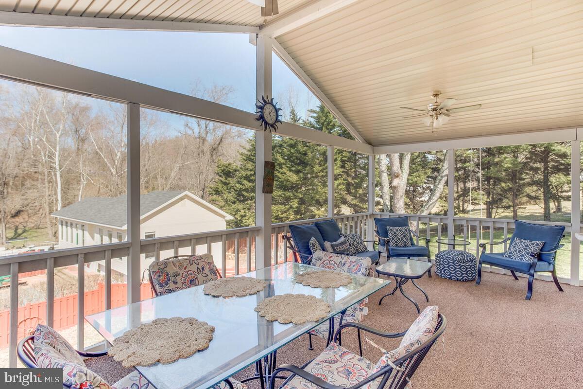 6269 Solomons Island Road Tracys Landing, MD 20779 - Photo 58 of 99 Screened porch
