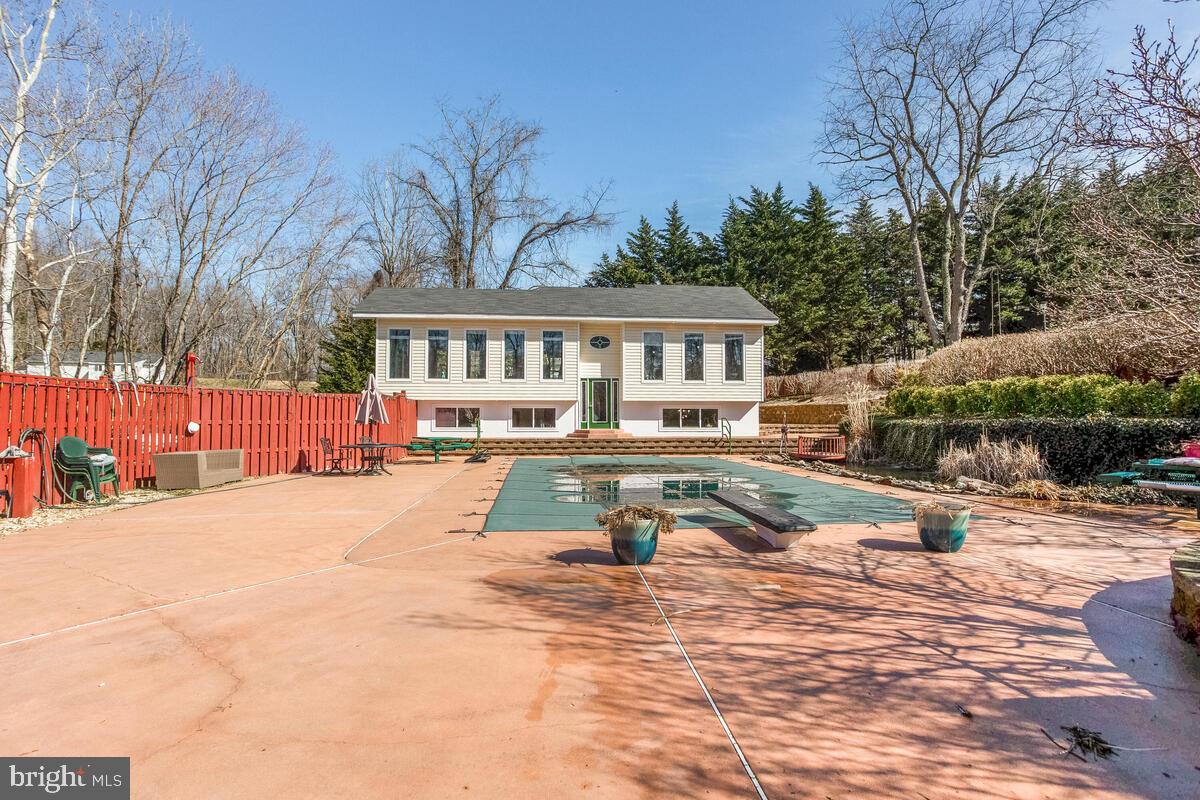 6269 Solomons Island Road Tracys Landing, MD 20779 - Photo 65 of 99 Pool area to pool house