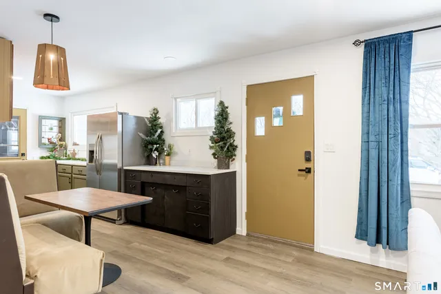 a view of living room and kitchen