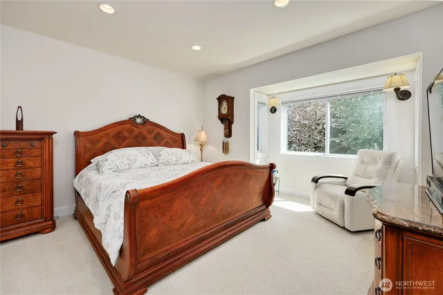 a view of parking garage with cars