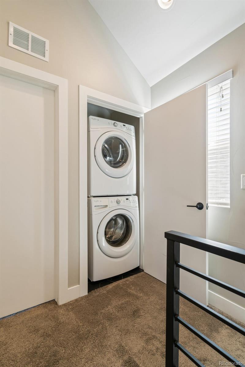 4306 Sherman Street Denver, CO 80216 - Photo 22 of 32 a utility room with sink dryer and washer