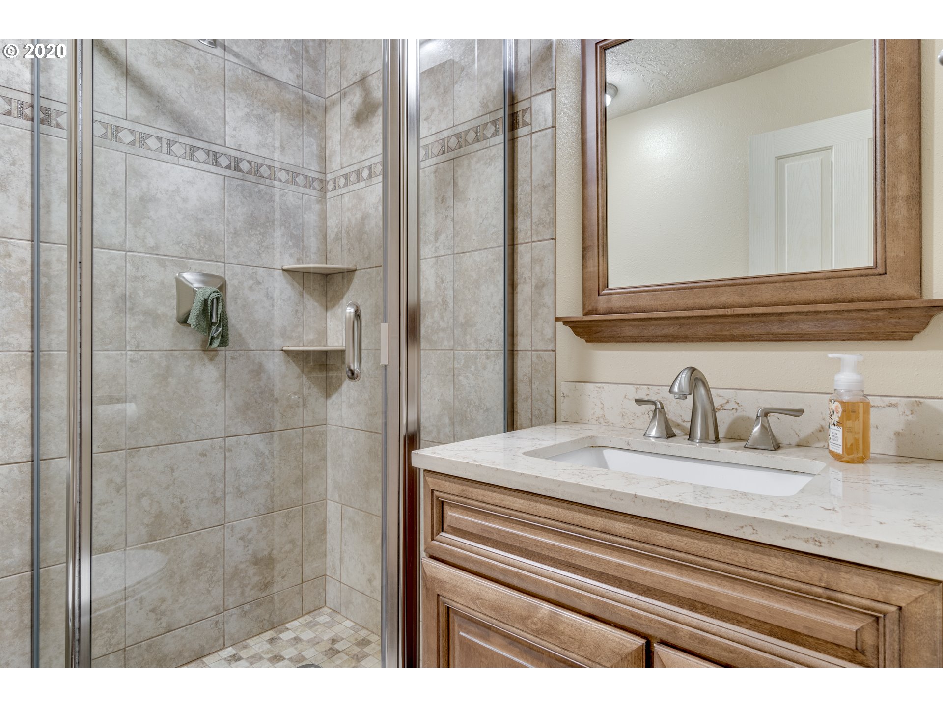 18400 Southeast Richey Road Gresham, OR 97080 - Photo 13 of 32 a bathroom with a sink and a mirror