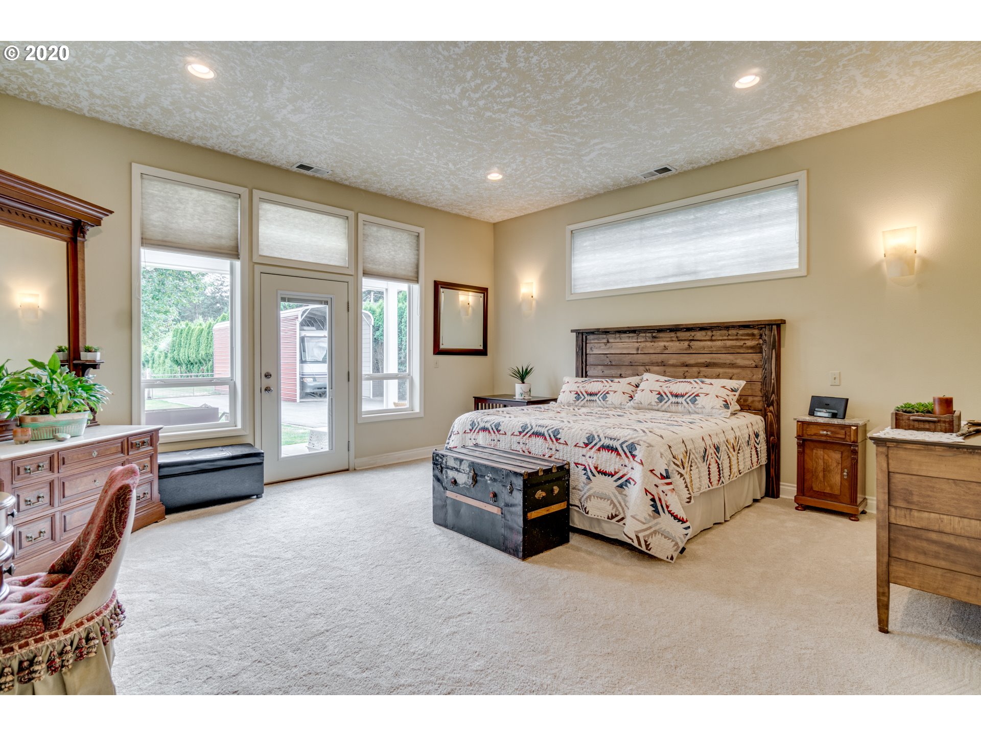 18400 Southeast Richey Road Gresham, OR 97080 - Photo 17 of 32 a bedroom with a bed couch and windows