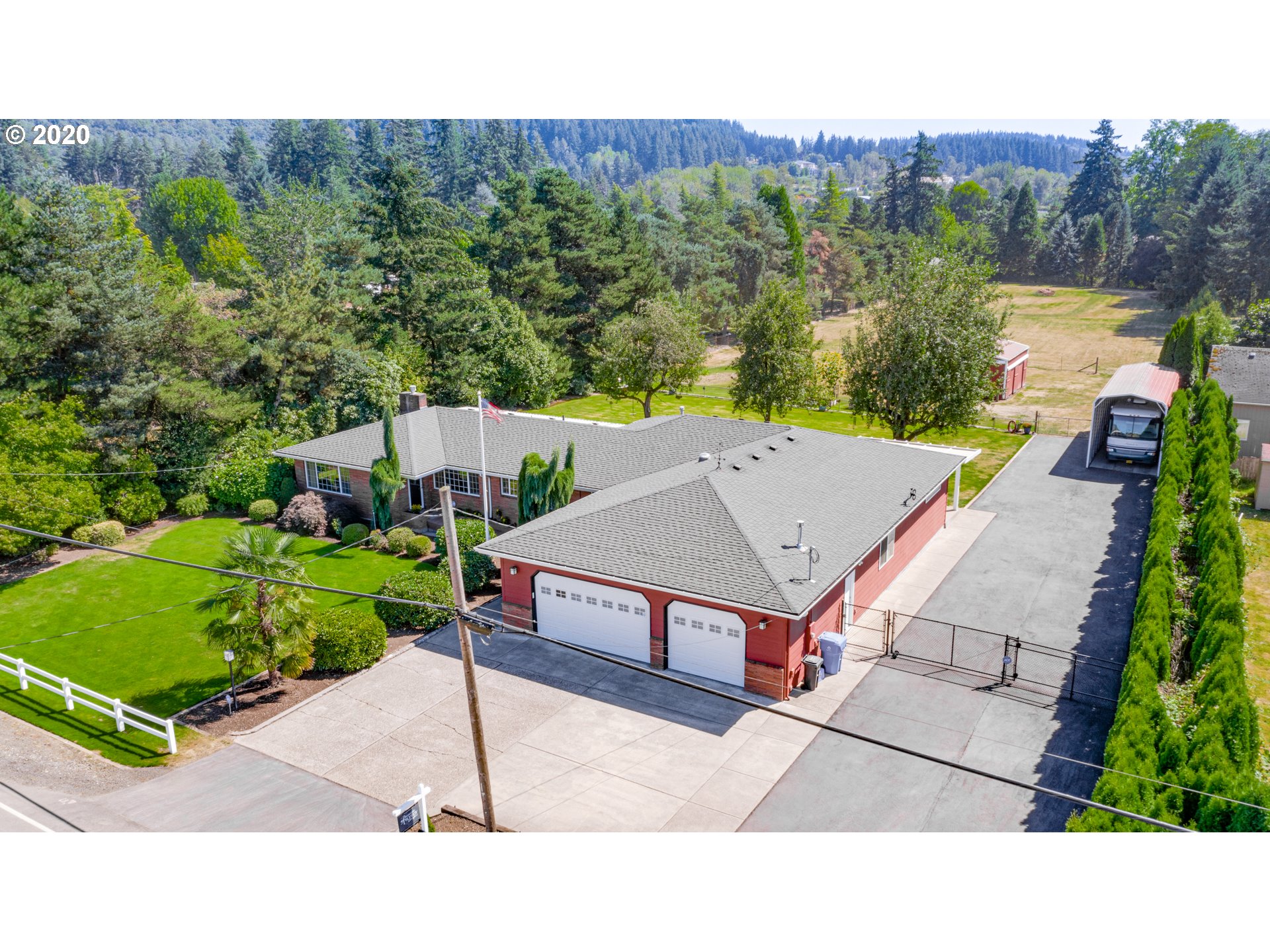 18400 Southeast Richey Road Gresham, OR 97080 - Photo 2 of 32 a view of a terrace with a garden