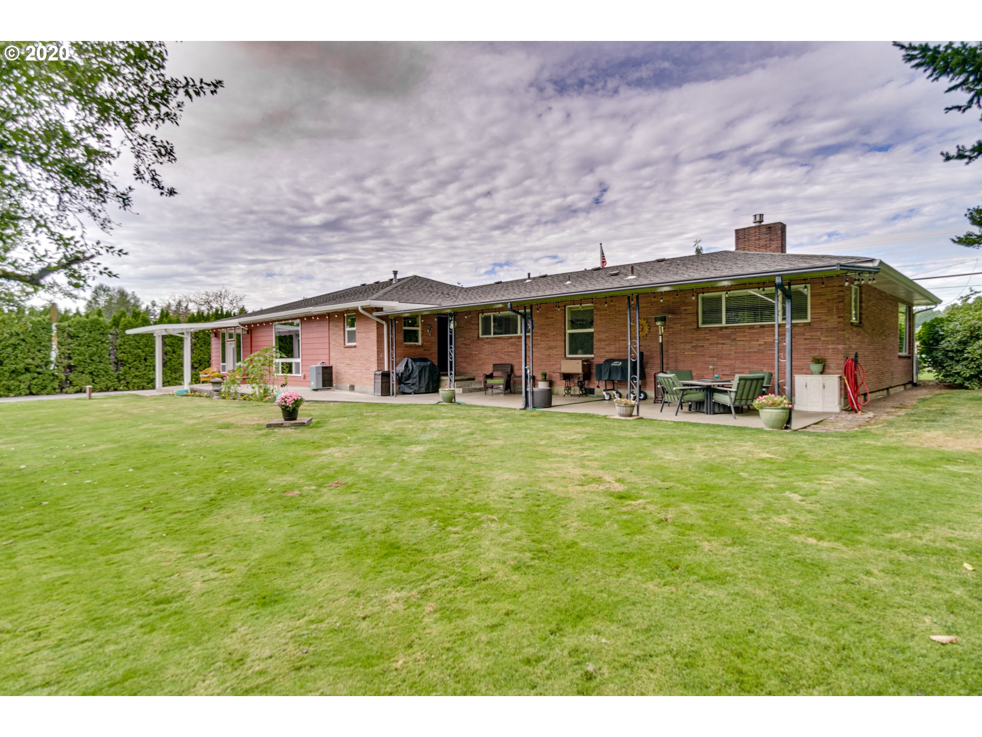 18400 Southeast Richey Road Gresham, OR 97080 - Photo 26 of 32 a front view of house with outdoor seating and green space