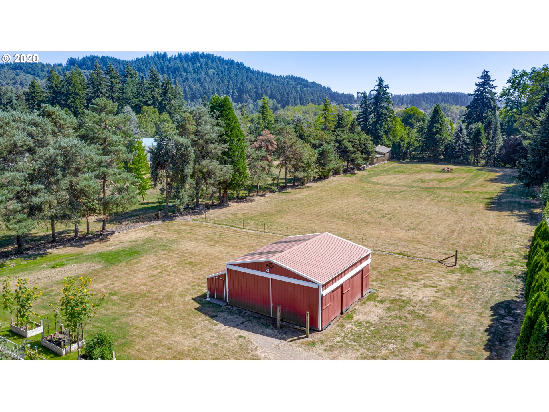 18400 Southeast Richey Road Gresham, OR 97080 - Photo 30 of 32 a backyard of a house with table and chairs