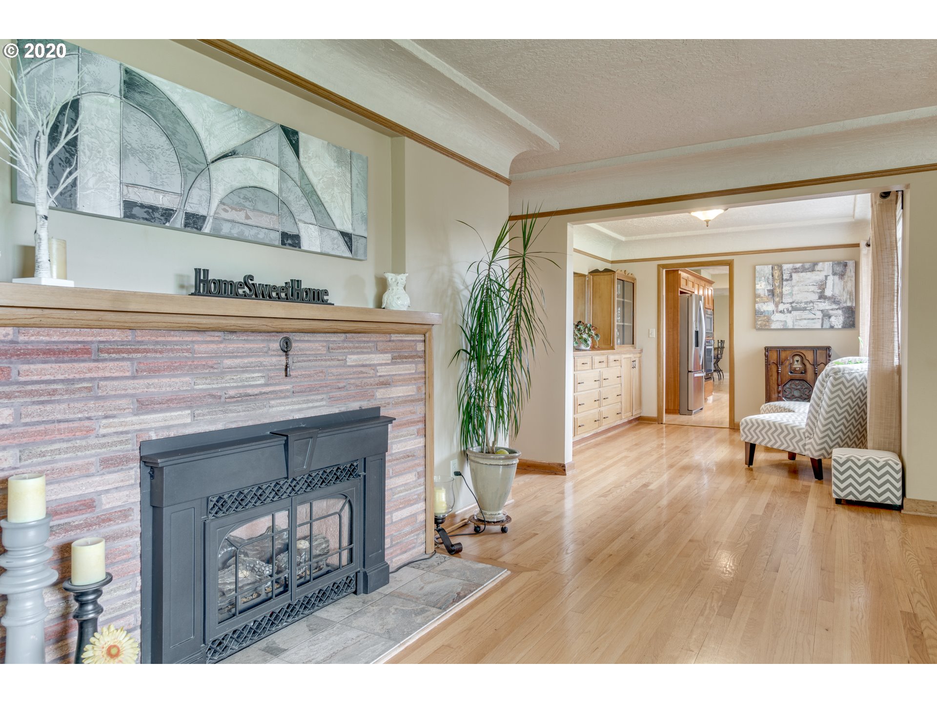 18400 Southeast Richey Road Gresham, OR 97080 - Photo 6 of 32 a living room with furniture and a fireplace