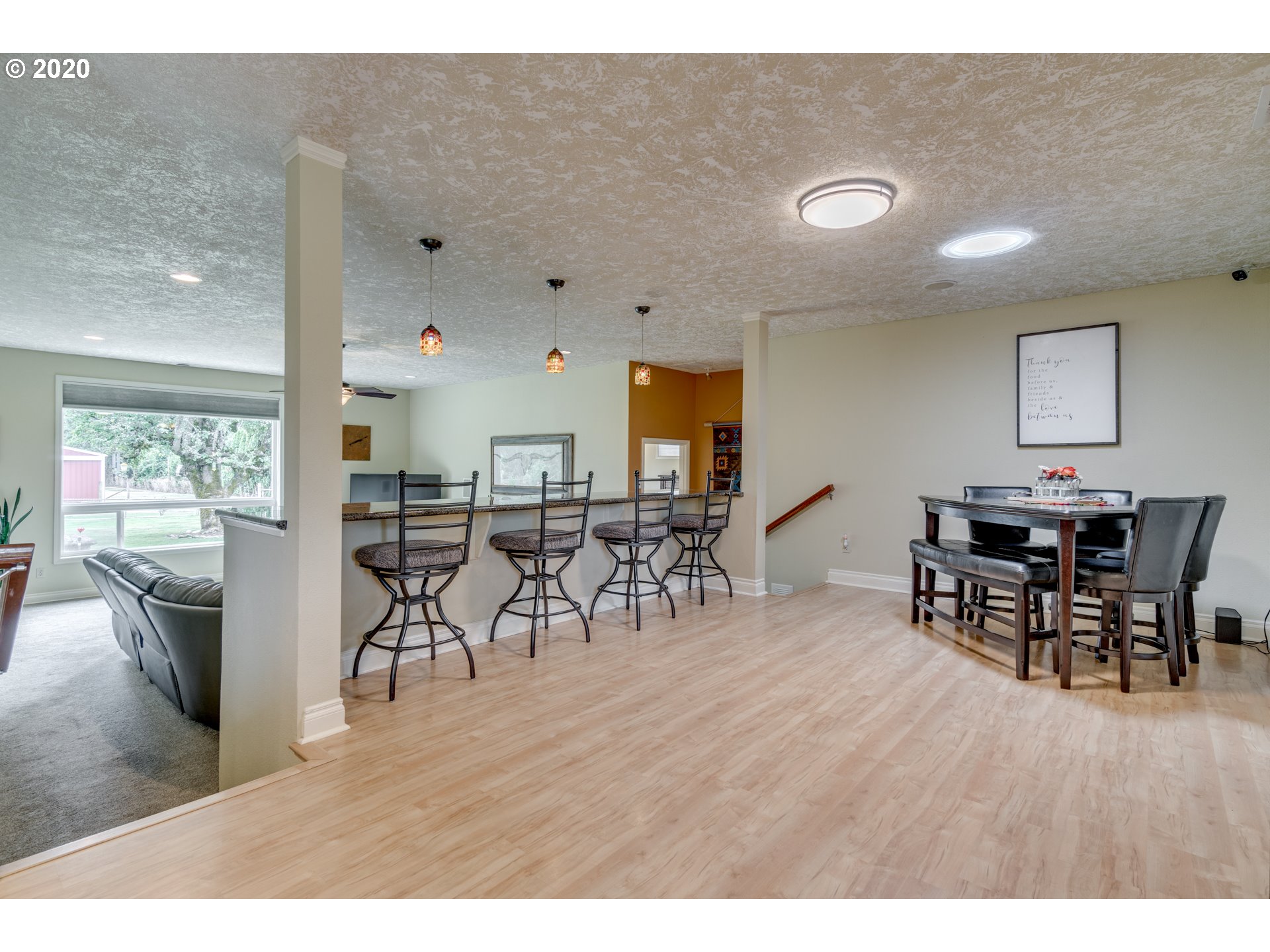 18400 Southeast Richey Road Gresham, OR 97080 - Photo 10 of 32 a view of a dining room with furniture and wooden floor