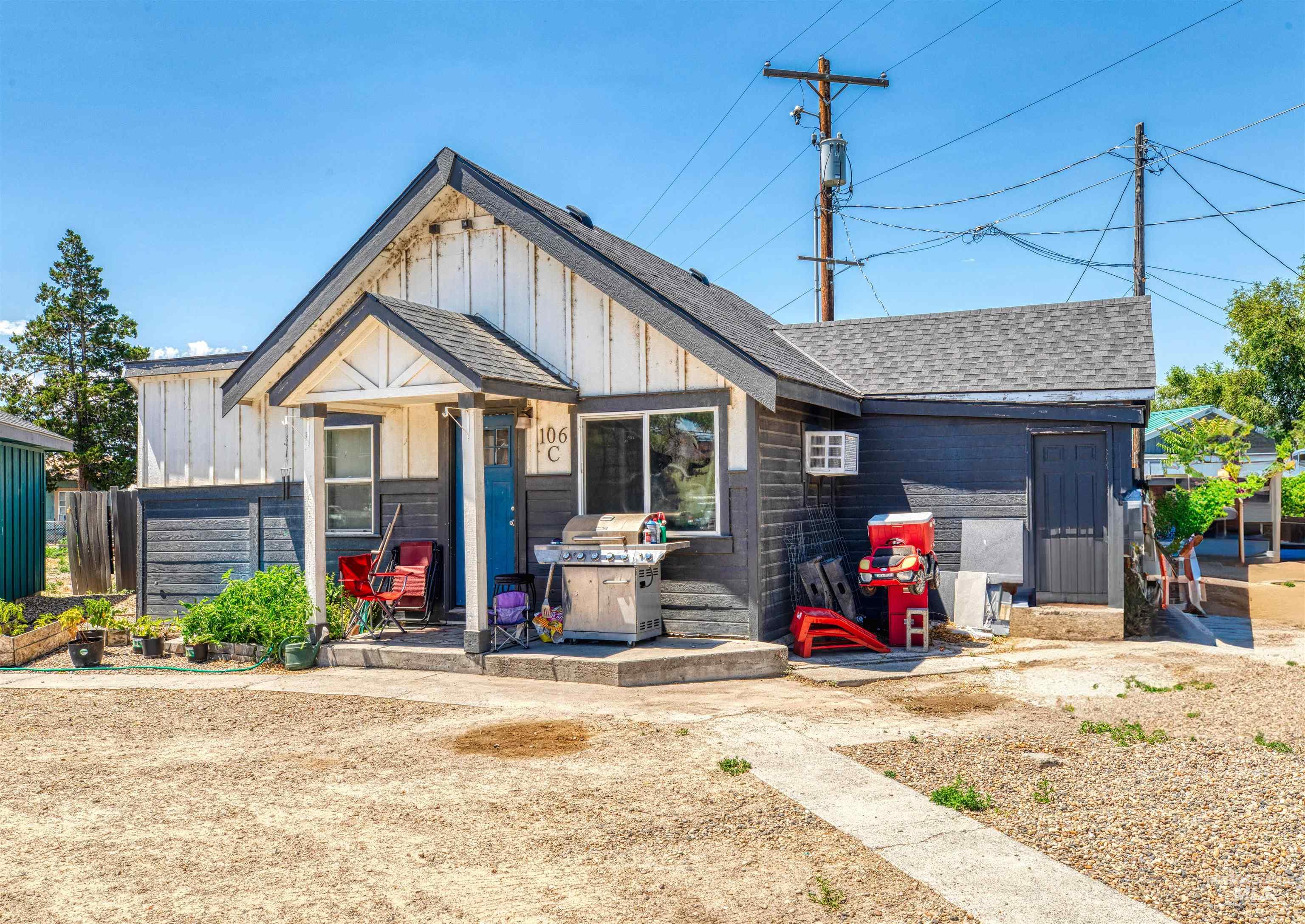106 East Main Street Nyssa, OR 97913 - Photo 22 of 32 View of front of property with board and batten siding and roof with shingles