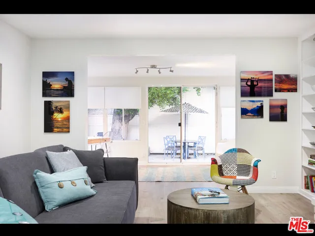 a living room with furniture and window