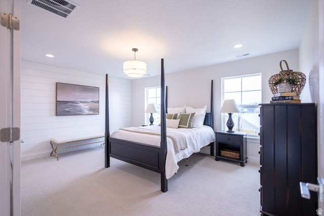 209 North 1140 West Mapleton, UT 84664 - Photo 9 of 21 Bedroom featuring light colored carpet, multiple windows, recessed lighting, and wood walls