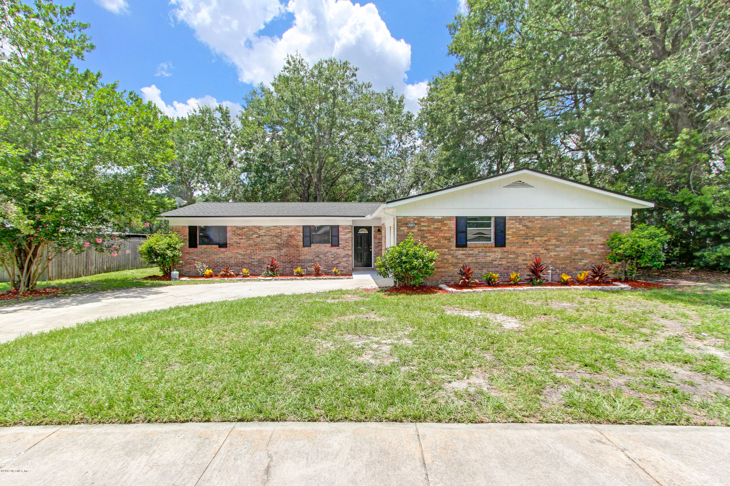 8236 Cassie Road Jacksonville, FL 32221 - Photo 1 of 29 a house view with a garden space