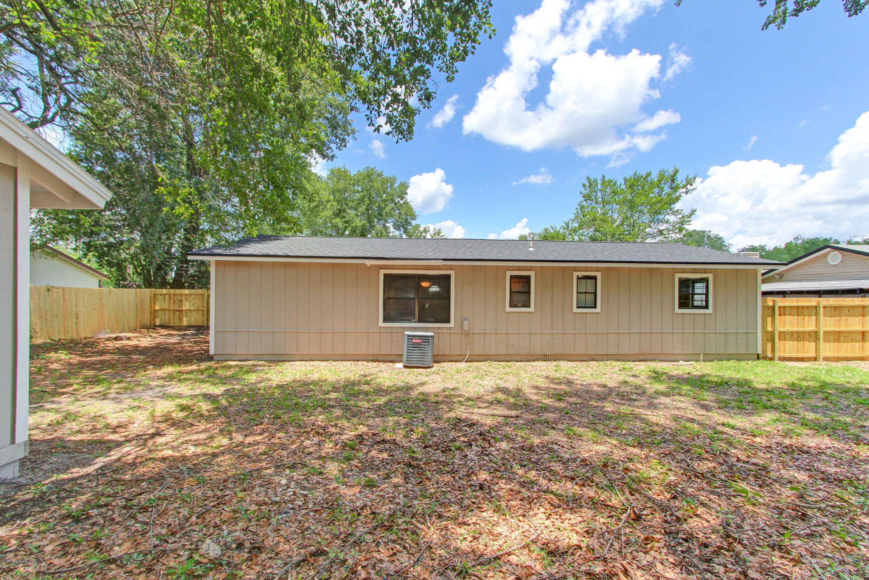 8236 Cassie Road Jacksonville, FL 32221 - Photo 28 of 29 front view of a house with a yard