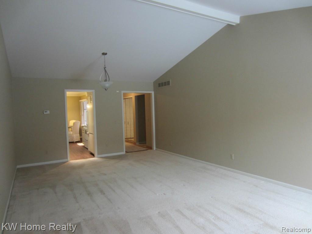 2210 London Bridge Drive, Unit 7 Rochester, MI 48307 - Photo 10 of 21 LONDON-GREAT ROOM.jpg