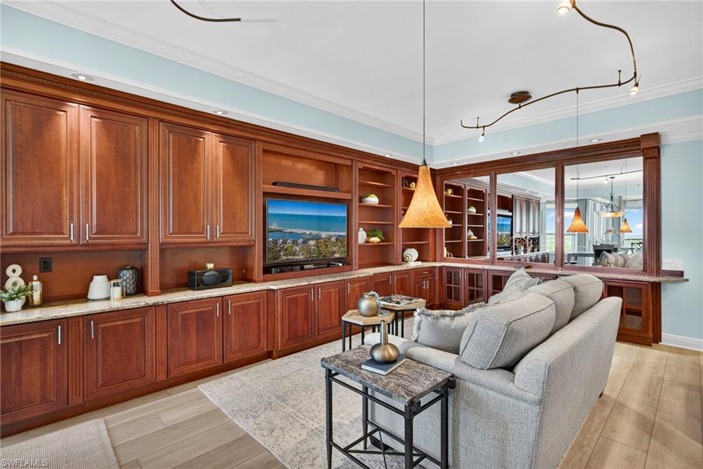 285 Grande Way, Unit 804 Naples, FL 34110 - Photo 18 of 50 a outdoor space with patio furniture and a potted plant