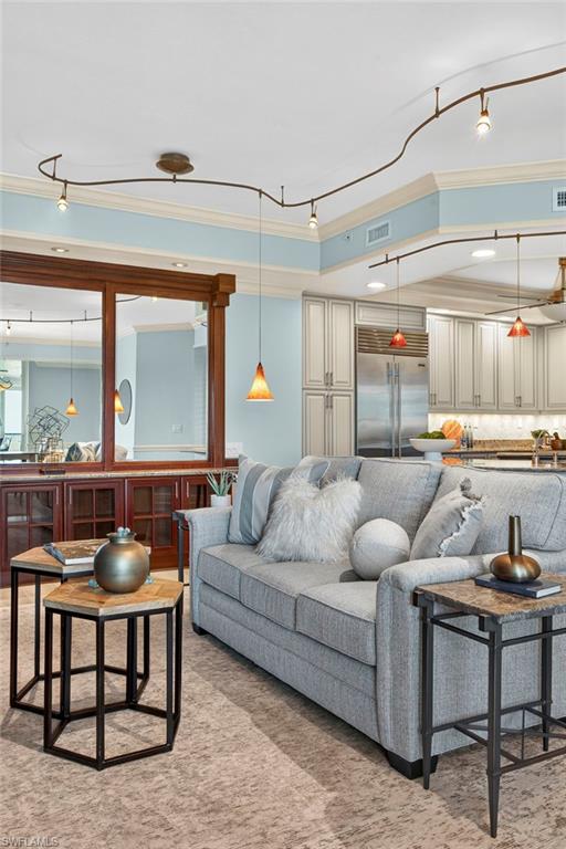 285 Grande Way, Unit 804 Naples, FL 34110 - Photo 23 of 50 a living room with furniture