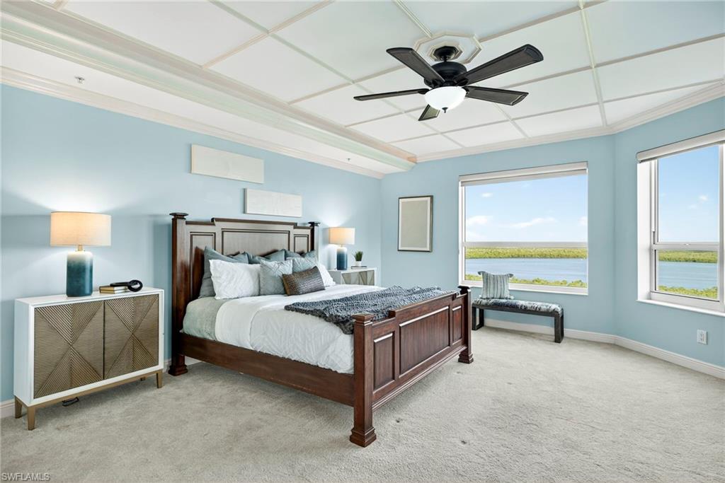 285 Grande Way, Unit 804 Naples, FL 34110 - Photo 26 of 50 a bed room with bed and window