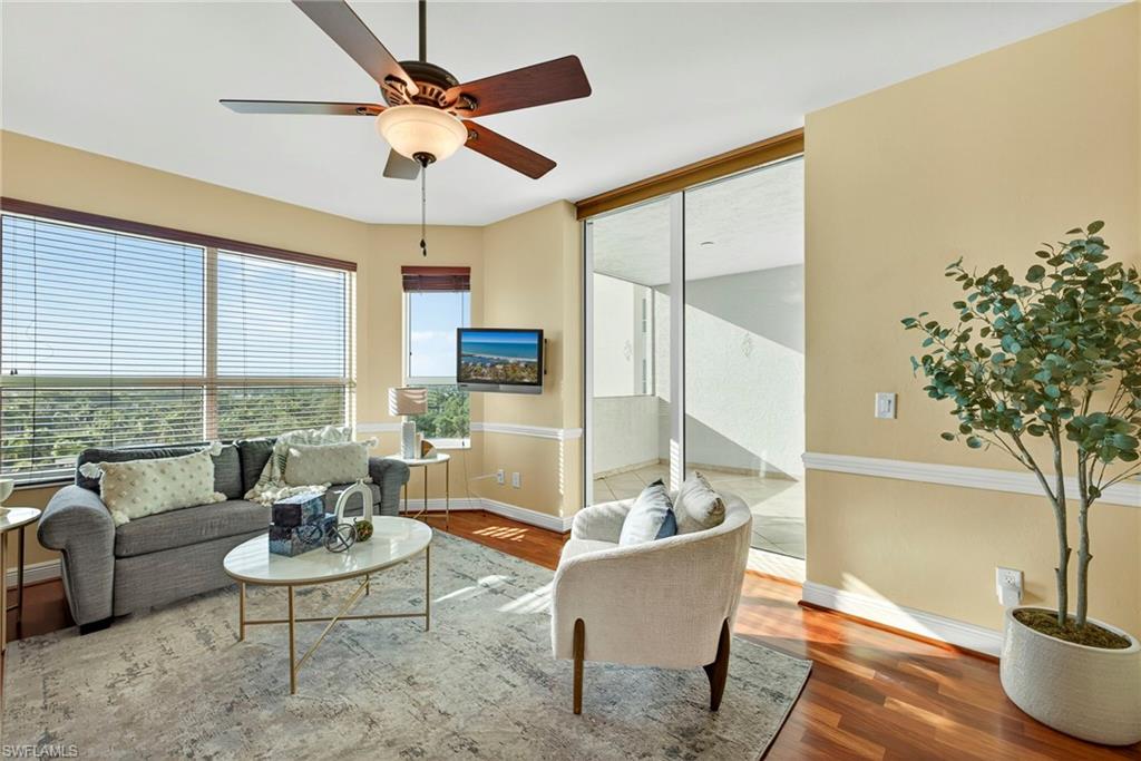 285 Grande Way, Unit 804 Naples, FL 34110 - Photo 30 of 50 a living room with furniture and a large window