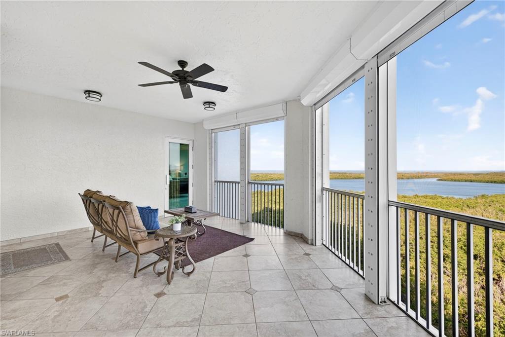 285 Grande Way, Unit 804 Naples, FL 34110 - Photo 34 of 50 a view of a dining room with furniture window and outside view